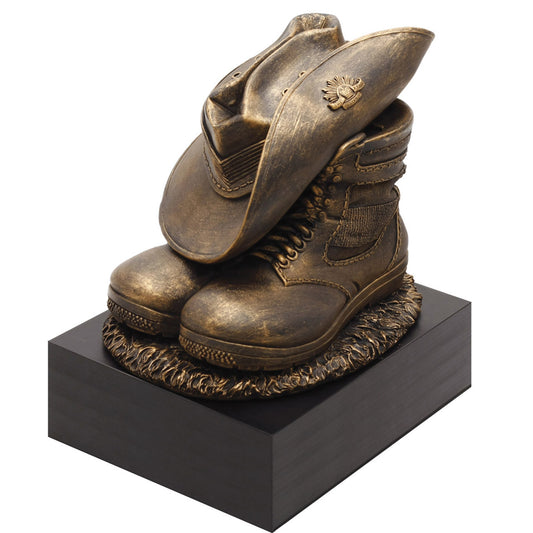 The Master Creations Stand Down Figurine is the perfect present for serving members or veterans. This cold-cast bronze figurine mounted on a wooden block depicts a soldier's slouch hat placed on his combat boots at the end of a long day. This versatile piece can be used as bookends, trophies and will make a great farewell gift. A timeless piece to evoke emotions and discussion. www.moralepatches.com.au