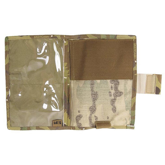 A 1000D Cordura protective cover for your issue Field Survey Notebook, held in by an elastic loop.  The Survey Notebook Cover also provides a sleeve for Maps etc. with a clear plastic window and two more sleeves beneath the Map sleeve for miscellaneous paperwork or objects. It also features an elastic loop for a pen or pencil. www.moralepatches.com.au