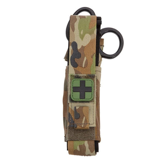 This Tourniquet Pouch has been upgraded to be more versatile allowing adjustment both up and down of the positioning of the Tourniquet with Velcro. This adjustment provides more suitability with different sized Tourniquets. www.moralepatches.com.au