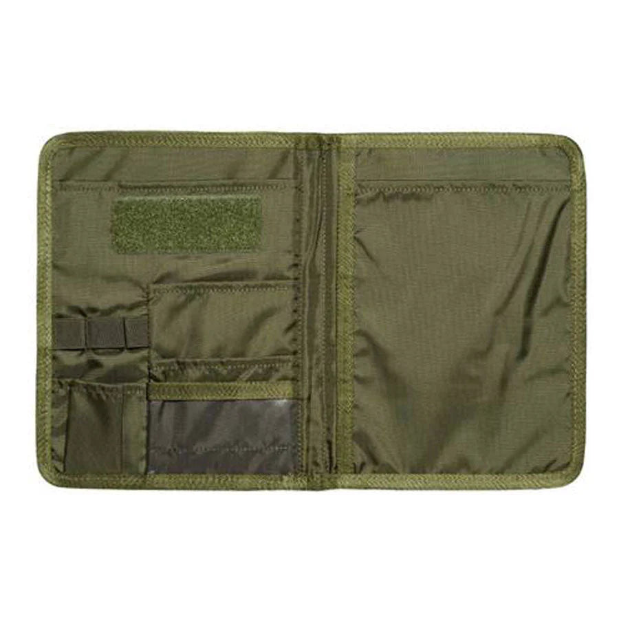 Features: Suitable for A5 notebooks Hook-and-loop closure patch on the frontside (loop) Organizer Pen holder Closable by bungee cord www.moralepatches.com.au