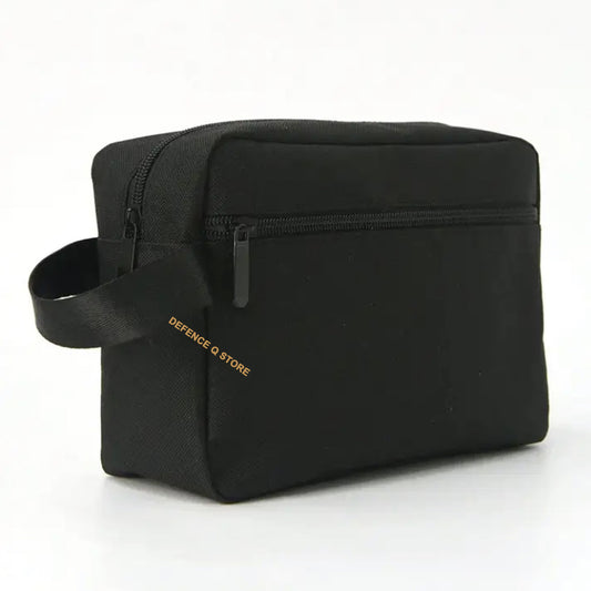 This Toiletry Bag Black is a must-have for any traveler. With dimensions of 16.5cm (H) x 23cm (W) x 9cm (D), it's perfect for storing toiletries and accessories. Made from 100% Polyester, it boasts a sleek and durable design. The side carry handle, front pocket compartment with closeable zip, and top zip closure make it a convenient and stylish choice. www.moralepatches.com.au