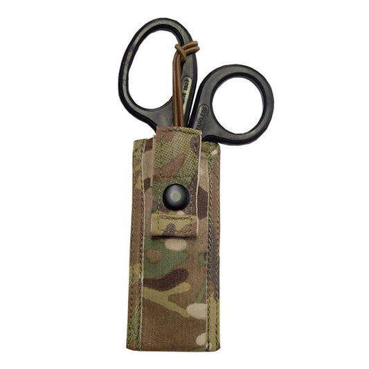 Sleek, light weight, basic and effective. Holds a single pair of medium sized trauma shears in a padded sleeve with an easy access elastic tab retention system that is easily operated with one hand. Requires one MOLLE column for attachment. When seconds count, quick access to vital tools is essential. EMT SHEARS INCLUDED IN PURCHASE. www.moralepatches.com.au