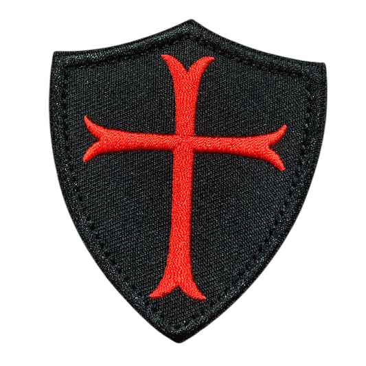 Experience the power and impact of&nbsp;Crusade Shield Black Embroidery Velcro Backed Patch in a compact 7.5x6.5cm size. Don't underestimate the potential of this patch - it's the perfect addition to any outfit or accessory. Order now and discover the endless possibilities! www.moralepatches.com.au