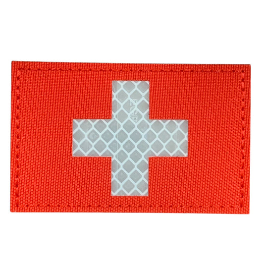 This Medic Reflective Laser Cut Patch is an essential addition to any gear collection! The durable hook and loop backing ensures easy attachment to any surface. Measuring at 8x5cm, this patch is the perfect size for visibility and practicality. Both the hook and loop pieces are provided, making application a breeze. Don't miss out on the value and versatility of this patch! www.moralepatches.com.au