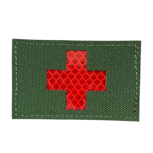 This Medic Reflective Laser Cut Patch is an essential addition to any gear collection! The durable hook and loop backing ensures easy attachment to any surface. Measuring at 8x5cm, this patch is the perfect size for visibility and practicality. Both the hook and loop pieces are provided, making application a breeze. Don't miss out on the value and versatility of this patch! www.moralepatches.com.au