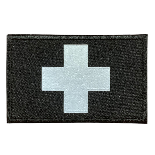 This Medic Reflective Laser Cut Patch is an essential addition to any gear collection! The durable hook and loop backing ensures easy attachment to any surface. Measuring at 8x5cm, this patch is the perfect size for visibility and practicality. Both the hook and loop pieces are provided, making application a breeze. Don't miss out on the value and versatility of this patch! www.moralepatches.com.au