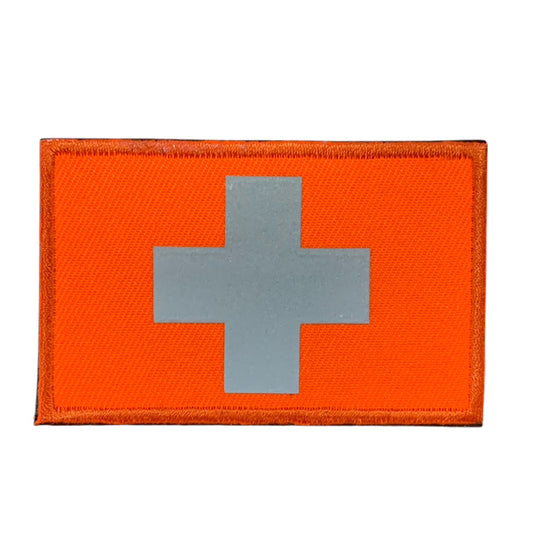 This Medic Reflective Laser Cut Patch is an essential addition to any gear collection! The durable hook and loop backing ensures easy attachment to any surface. Measuring at 8x5cm, this patch is the perfect size for visibility and practicality. Both the hook and loop pieces are provided, making application a breeze. Don't miss out on the value and versatility of this patch! www.moralepatches.com.au