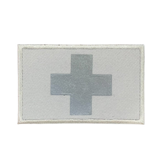 This Medic Reflective Laser Cut Patch is an essential addition to any gear collection! The durable hook and loop backing ensures easy attachment to any surface. Measuring at 8x5cm, this patch is the perfect size for visibility and practicality. Both the hook and loop pieces are provided, making application a breeze. Don't miss out on the value and versatility of this patch! www.moralepatches.com.au