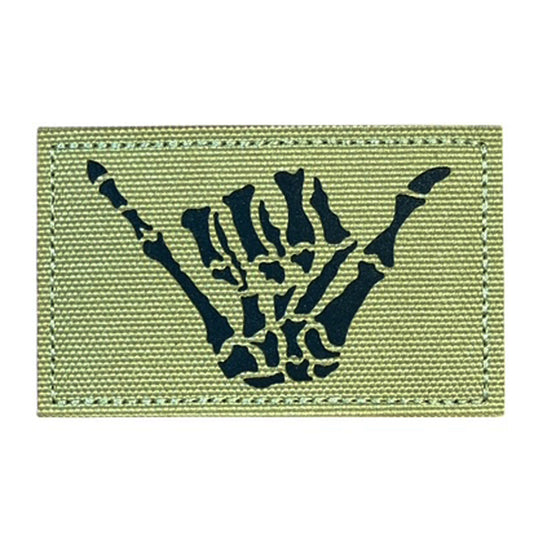 Make a bold statement with the Cool Hand Laser Cut Tan Patch. This striking 8x5cm patch features laser-cut precision detailing that demands attention. Backed with both hook and loop fasteners, it's ready to attach to tactical gear, backpacks, or uniforms instantly. www.moralepatches.com.au