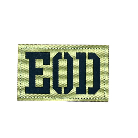 Make a bold statement with the EOD Laser Cut Tan Patch. This striking 8x5cm patch features laser-cut precision detailing that demands attention. Backed with both hook and loop fasteners, it's ready to attach to tactical gear, backpacks, or uniforms instantly. www.moralepatches.com.au