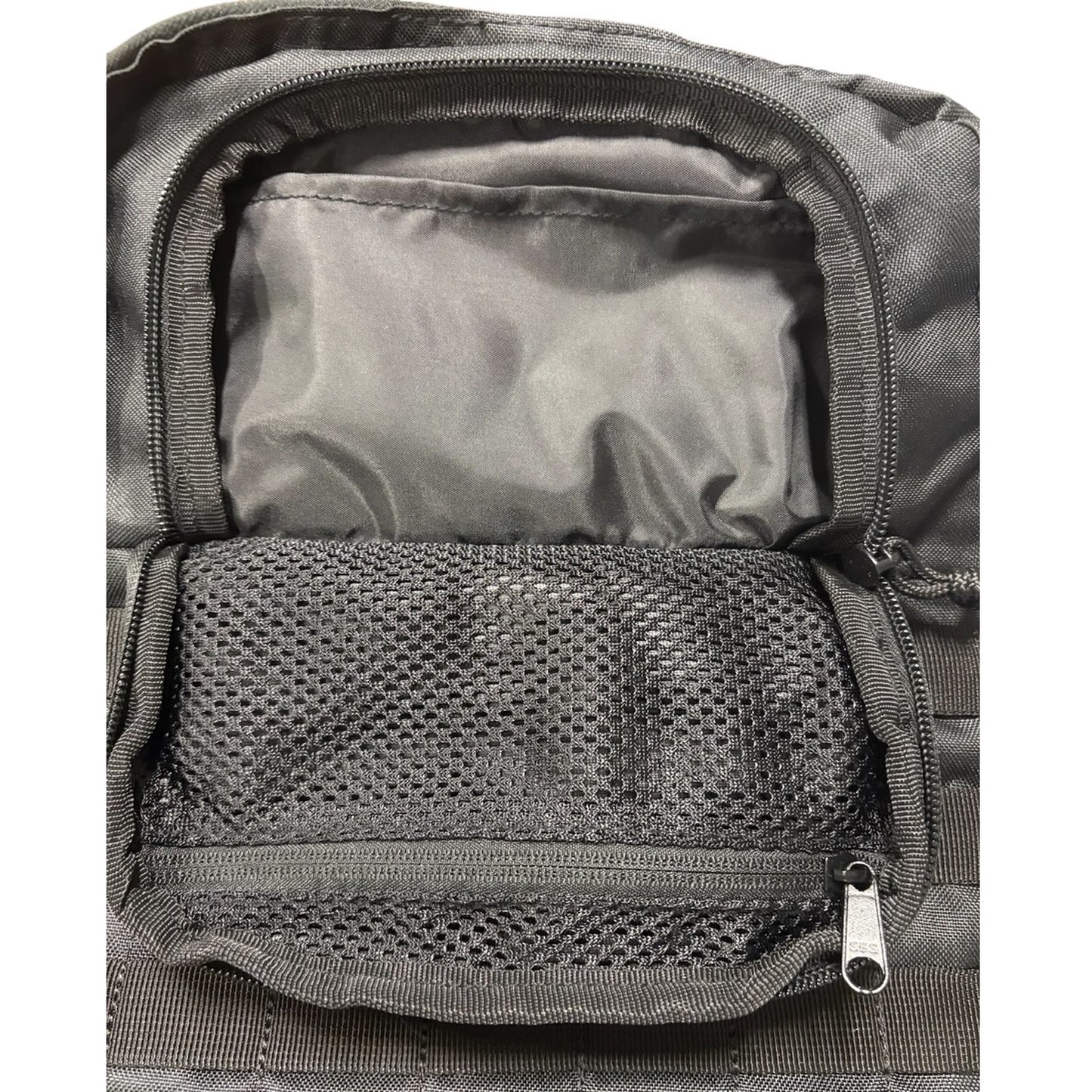 The Tactical 45LT Patrol Pack is designed for 2-3 day missions, featuring two main compartments for efficient gear organization. It includes a front pocket with an internal organizer, a dedicated hydration pocket, and a protective pouch for sunglasses. www.moralepatches.com.au