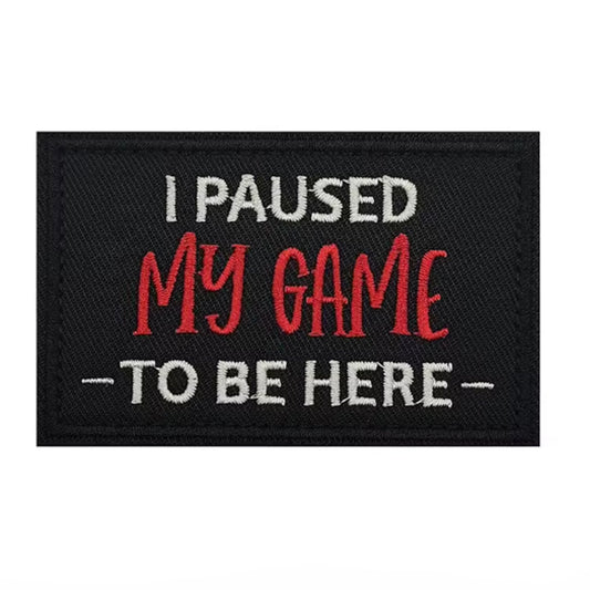 Unleash your attitude with the I Paused My Game To Be Here Embroidery Patch Hook &amp; Loop Featuring an embroidered design and hook &amp; loop backing, this 8x5cm patch is the perfect addition to your collection. Show off your unapologetic confidence and unique sense of humour with this high-quality product. www.moralepatches.com.au