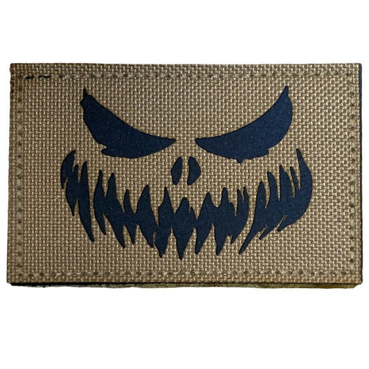 Haunting Laser Cut Tan Patch Hook & Loop.   Size: 8x5cm  HOOK AND LOOP BACKED PATCH(BOTH PROVIDED) www.moralepatches.com.au