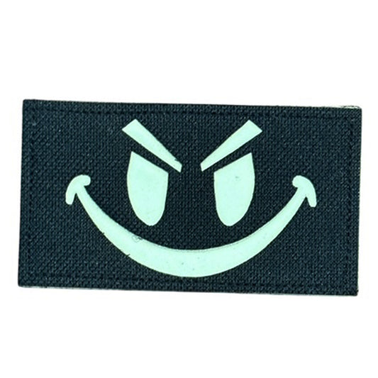 Make a bold statement with the Evil Smile 9x5cm Laser Cut Black Patch Hook &amp; Loop . This striking 9x5cm patch features laser-cut precision detailing that demands attention. Backed with both hook and loop fasteners, it's ready to attach to tactical gear, backpacks, or uniforms instantly. www.moralepatches.com.au