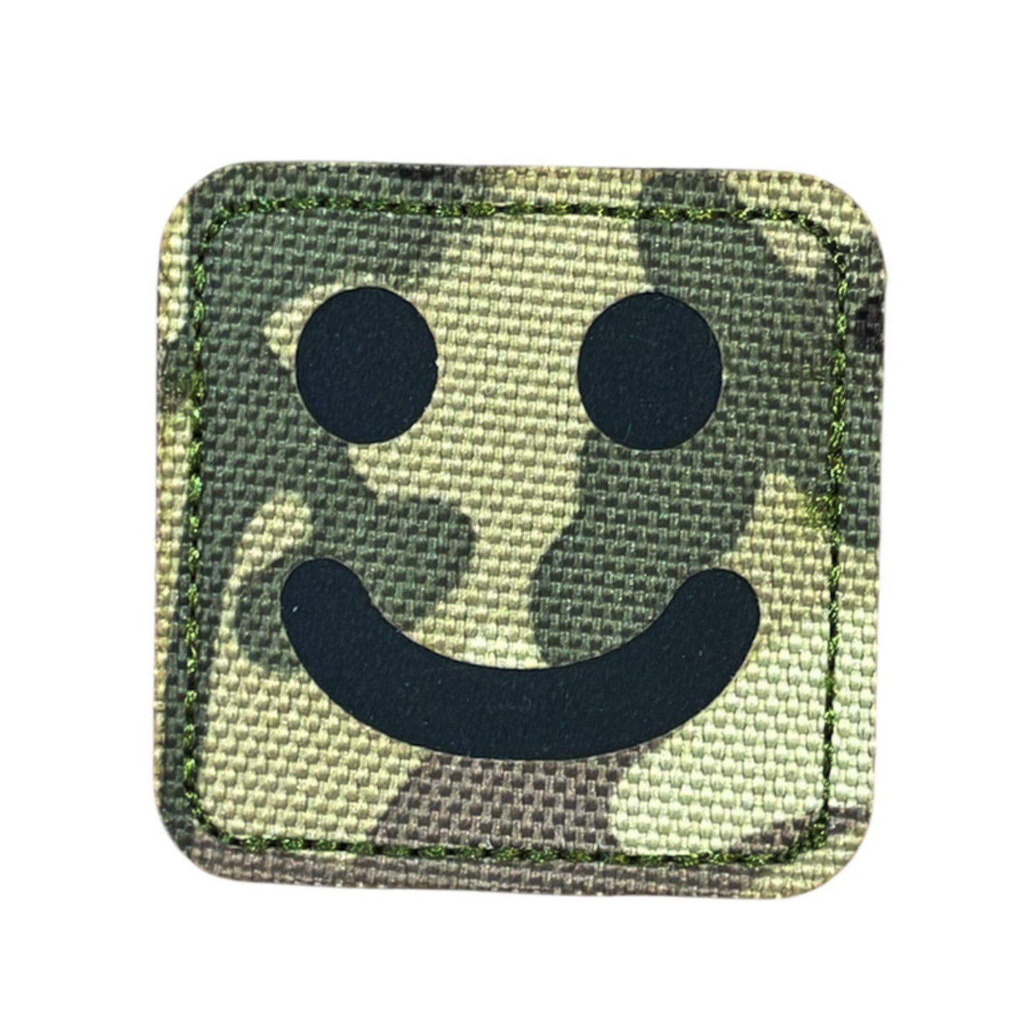 Make a bold statement with the Smiley Laser Cut Multicam Patch. This striking 5x5cm patch features laser-cut precision detailing that demands attention. Backed with both hook and loop fasteners, it's ready to attach to tactical gear, backpacks, or uniforms instantly. www.moralepatches.com.au