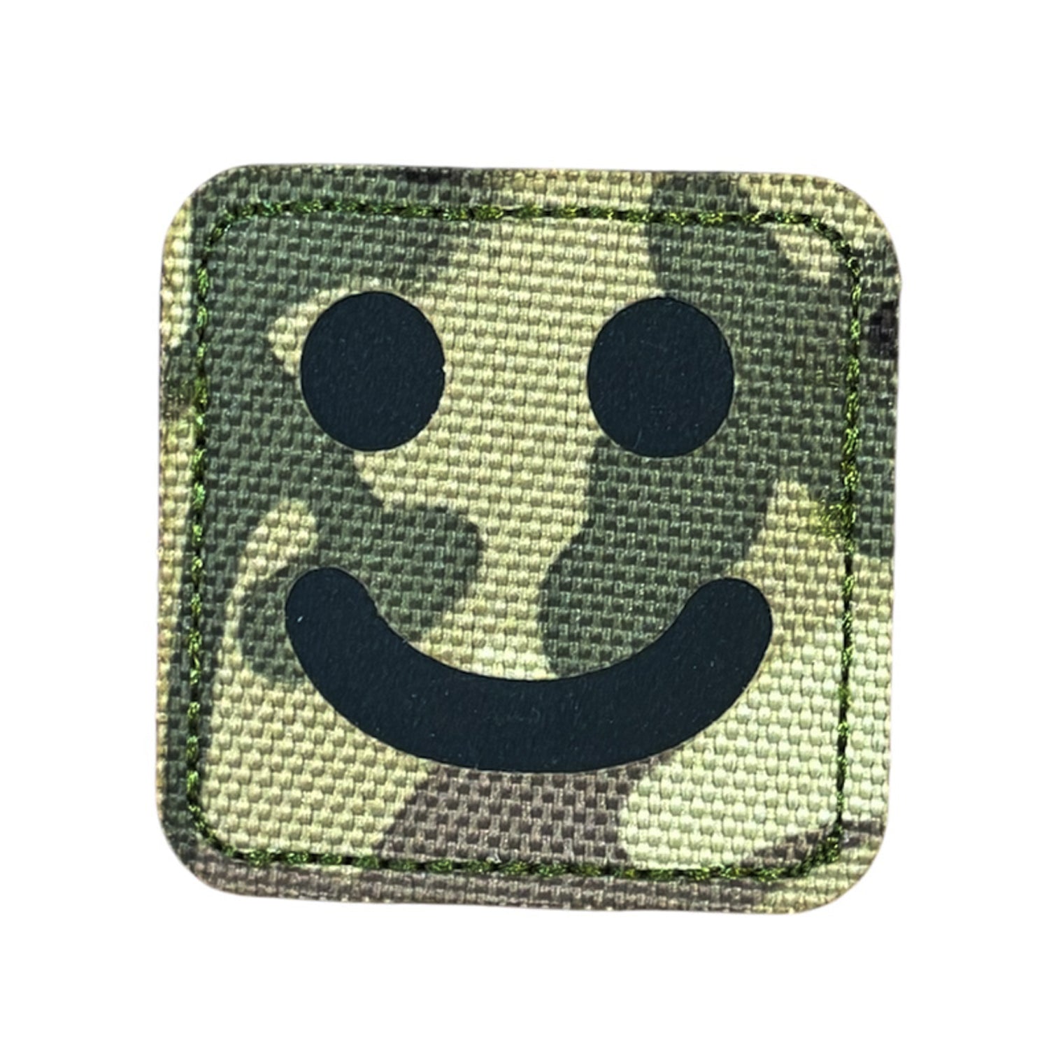 Make a bold statement with the Smiley Laser Cut Multicam Patch. This striking 5x5cm patch features laser-cut precision detailing that demands attention. Backed with both hook and loop fasteners, it's ready to attach to tactical gear, backpacks, or uniforms instantly. www.moralepatches.com.au