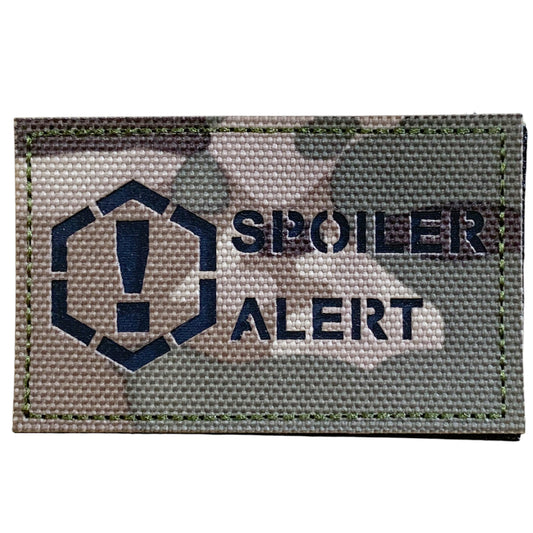 Inspire with the power of the Spoiler Alert Laser Cut Patch! This hook and loop backed patch measures 5x8cm, and comes in a vibrant Multicam design to add flair to any patch collection. Both the hook and loop backing are provided for easy attachment. Don't miss out on this must-have addition to your collection! www.moralepatches.com.au