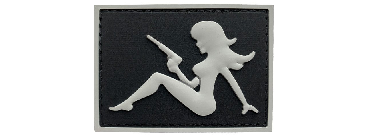 Mudflap Girl with Pistol on Right Hand PVC Patch, Velcro backed Badge. Great for attaching to your field gear, jackets, shirts, pants, jeans, hats or even create your own patch board.  Size: 7x5cm
