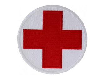 Round Cross Medic PVC Patch White, Velcro backed Badge. Great for attaching to your field gear, jackets, shirts, pants, jeans, hats or even create your own patch board.  Size: 6cm