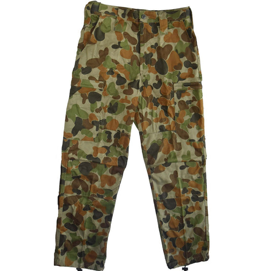 Auscam military pattern Field Trousers.  Cargo pockets on legs with zips.  Velcro adjustable waist with wide belt loops.  Elastic trouser ties at the ankle.  Colour: Auscam  Material: 100% Cotton (cooler and more breathable wear, than poly blends) www.moralepatches.com.au