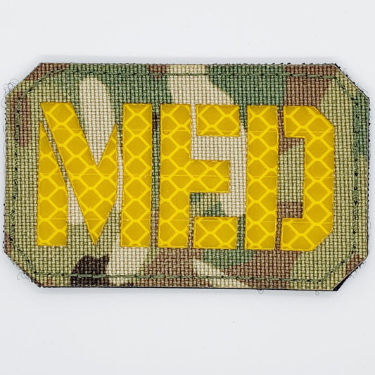 This Medic Reflective Laser Cut Patch is an essential addition to any gear collection! The durable hook and loop backing ensures easy attachment to any surface. Measuring at 8x5cm, this patch is the perfect size for visibility and practicality. Both the hook and loop pieces are provided, making application a breeze. Don't miss out on the value and versatility of this patch! www.moralepatches.com.au