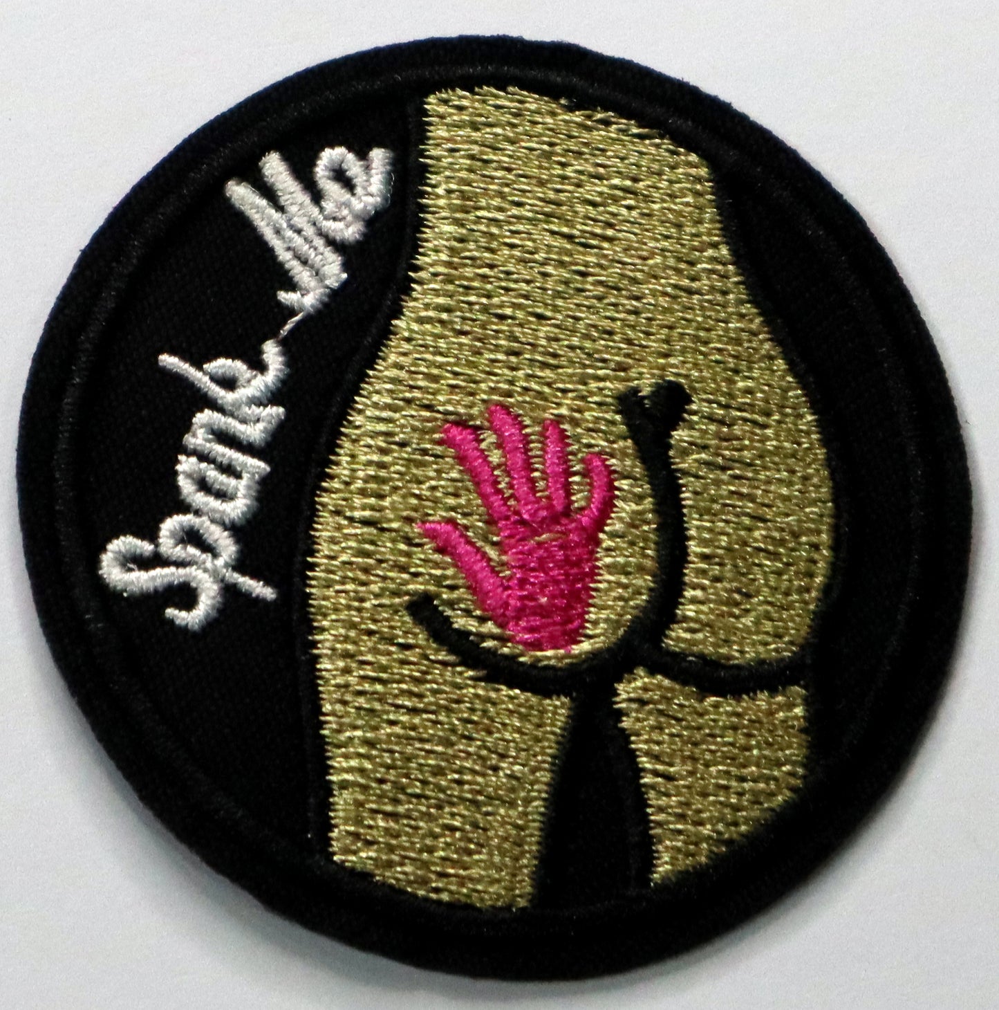 Spank me Iron On Patch. Great for attaching to your jackets, shirts, pants, jeans, hats.  Size: 5cm