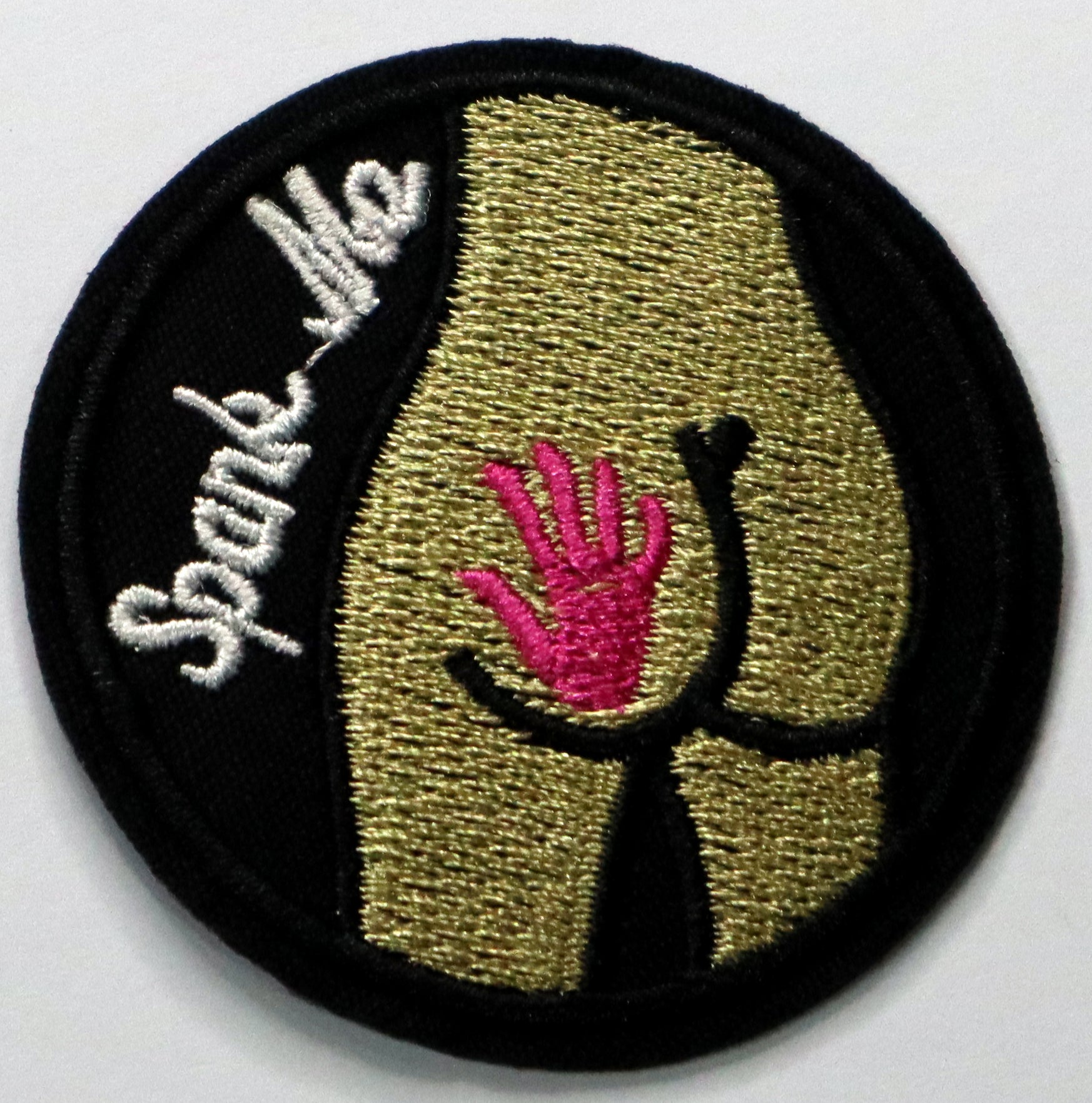 Spank me Iron On Patch. Great for attaching to your jackets, shirts, pants, jeans, hats.  Size: 5cm