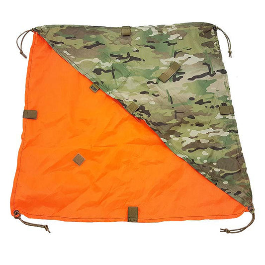 SORD Marker Panel - Lightweight design, only 70 grams - Full size is 58 cm square. - Folded size is 81cm accross the bottom edge, 40cm high. - Velcro loop attachment points for IFF. - Elastic loop points for cyalume's. - Elasticised tie down points on each corner. - Small velcro pocket for adding weight. - One side blaze orange. - One side multicam and can be unfolded to half orange and half multicam. www.moralepatches.com.au