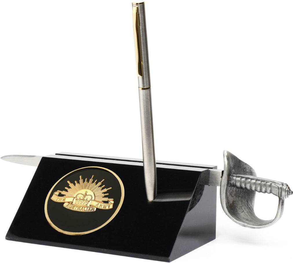 Army Medallion in a stylish acrylic desk stand with a quality pen and Army sword letter opener. Presented in a silver gift box with a clear lid, this is the perfect gift to put on the desk at work or at home.