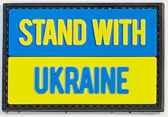 Stand with Ukraine PVC Patch, Velcro backed Badge. Great for attaching to your field gear, jackets, shirts, pants, jeans, hats or even create your own patch board.  Size: 7.5x5cm